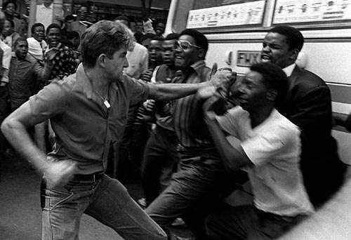 South Africa white man attacking black natives