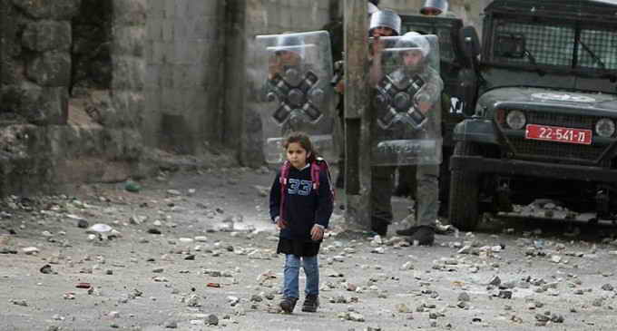 young Palestinian girl walking to school used as human shield by Israeli soldiers